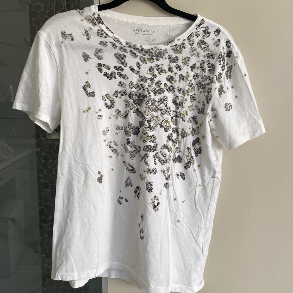 All saints size small white tee with snakeskin and daisys. Worn once. So cute